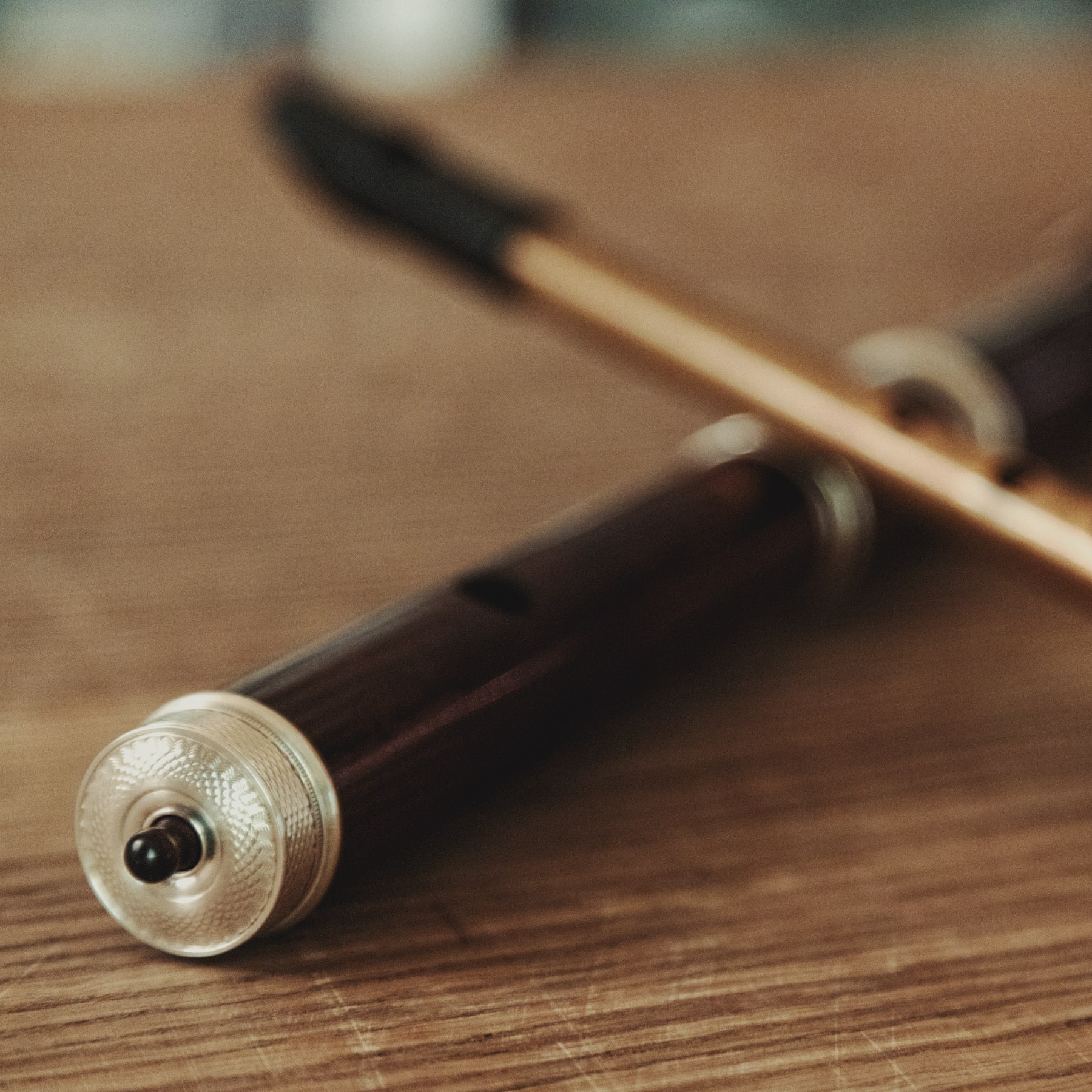 flute & whistle — atmospheric, low light · wide hero